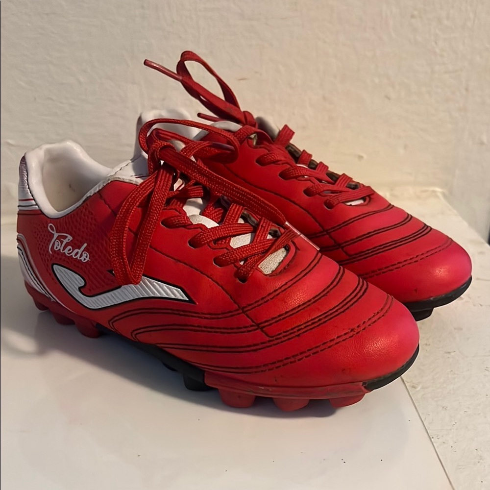 Red Soccer Cleats with Black Accents